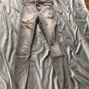 ripped grey jeans
